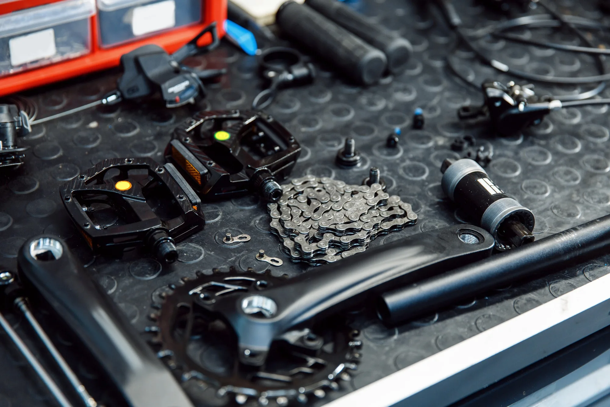 Bicycle workshop, cycle parts on the table closeup